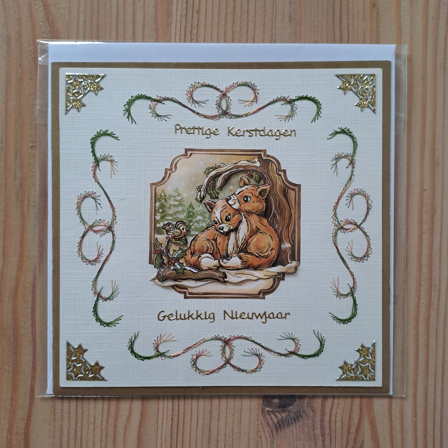 Wenskaart kerst geborduurd
